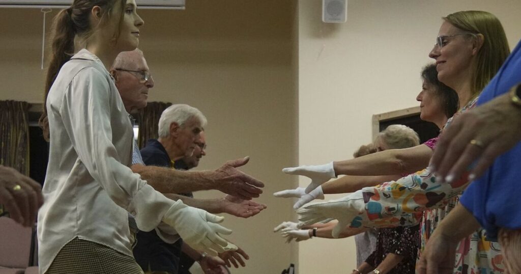 Jane Austen fans honor 250 years since her birth with grand costumed balls and dancing