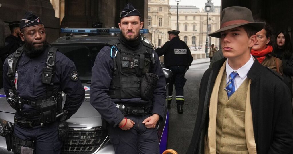 Fedora man unmasked: Meet the teen behind the Louvre mystery photo