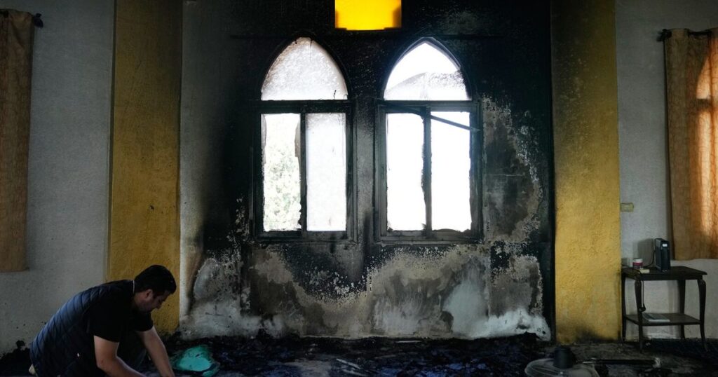 West Bank mosque is burned as Israeli settler violence surges