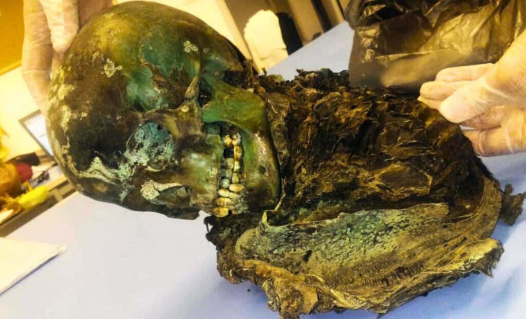Boy’s Body Buried Centuries Ago, Turned Green and Mummified by Copper Coffin