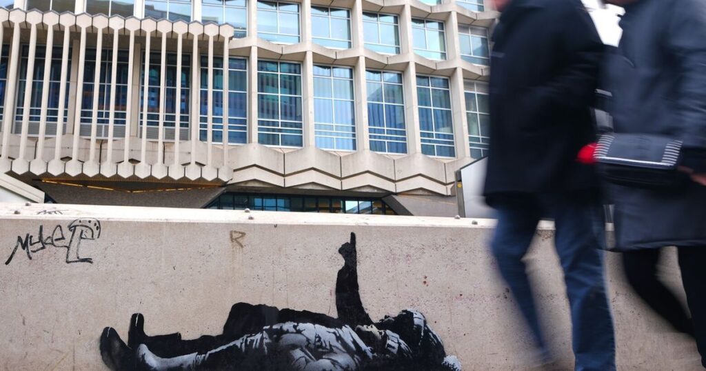 Banksy unveils new art in London following speculation over murals depicting stargazing figures